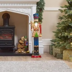 Norbert The 3ft Christmas Nutcracker With Staff 26 Norbert The 3ft Christmas Nutcracker With Staff -Twinkly Shop w18524 indoor lifestyle shot 1