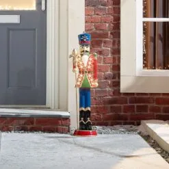 Norbert The 3ft Christmas Nutcracker With Staff 29 Norbert The 3ft Christmas Nutcracker With Staff -Twinkly Shop w18524 outdoor lifestyle shot 2