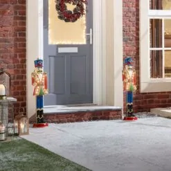 Norbert The 3ft Christmas Nutcracker With Staff 31 Norbert The 3ft Christmas Nutcracker With Staff -Twinkly Shop w18524 outdoor lifestyle shot 5