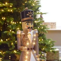 Norbert The 3ft Christmas Nutcracker With Staff 41 Norbert The 3ft Christmas Nutcracker With Staff -Twinkly Shop w18526 indoor lifestyle shot 4