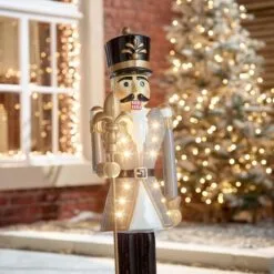 Norbert The 3ft Christmas Nutcracker With Staff 39 Norbert The 3ft Christmas Nutcracker With Staff -Twinkly Shop w18526 outdoor lifestyle shot 4